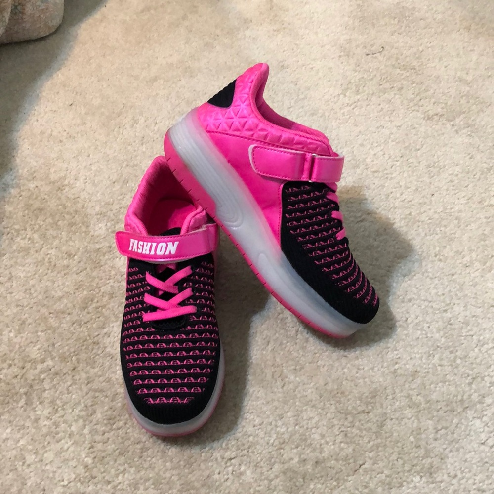 Light up shoes with wheels.